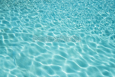 Shiny Blue Water Background. Abstract Clean Pool