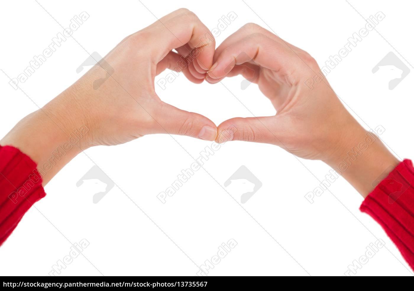 Mujer haciendo forma de corazón con las manos - Foto de archivo #13735567 |  Agencia de stock PantherMedia