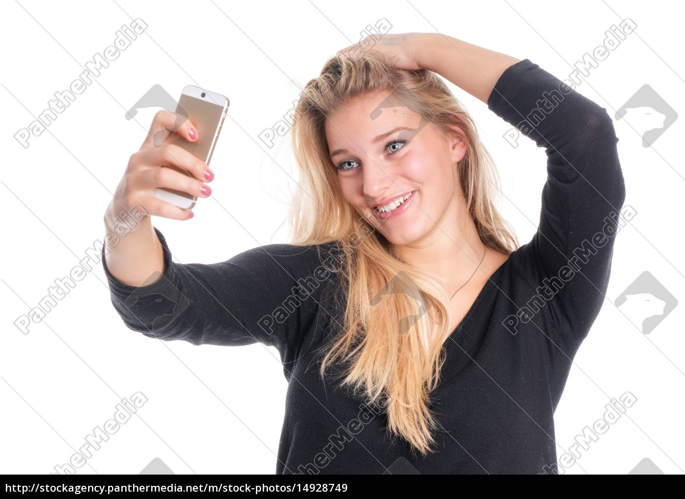 Pretty blonde takes a selfie with her phone and smiles - Stock Photo  #14928749 | PantherMedia Stock Agency