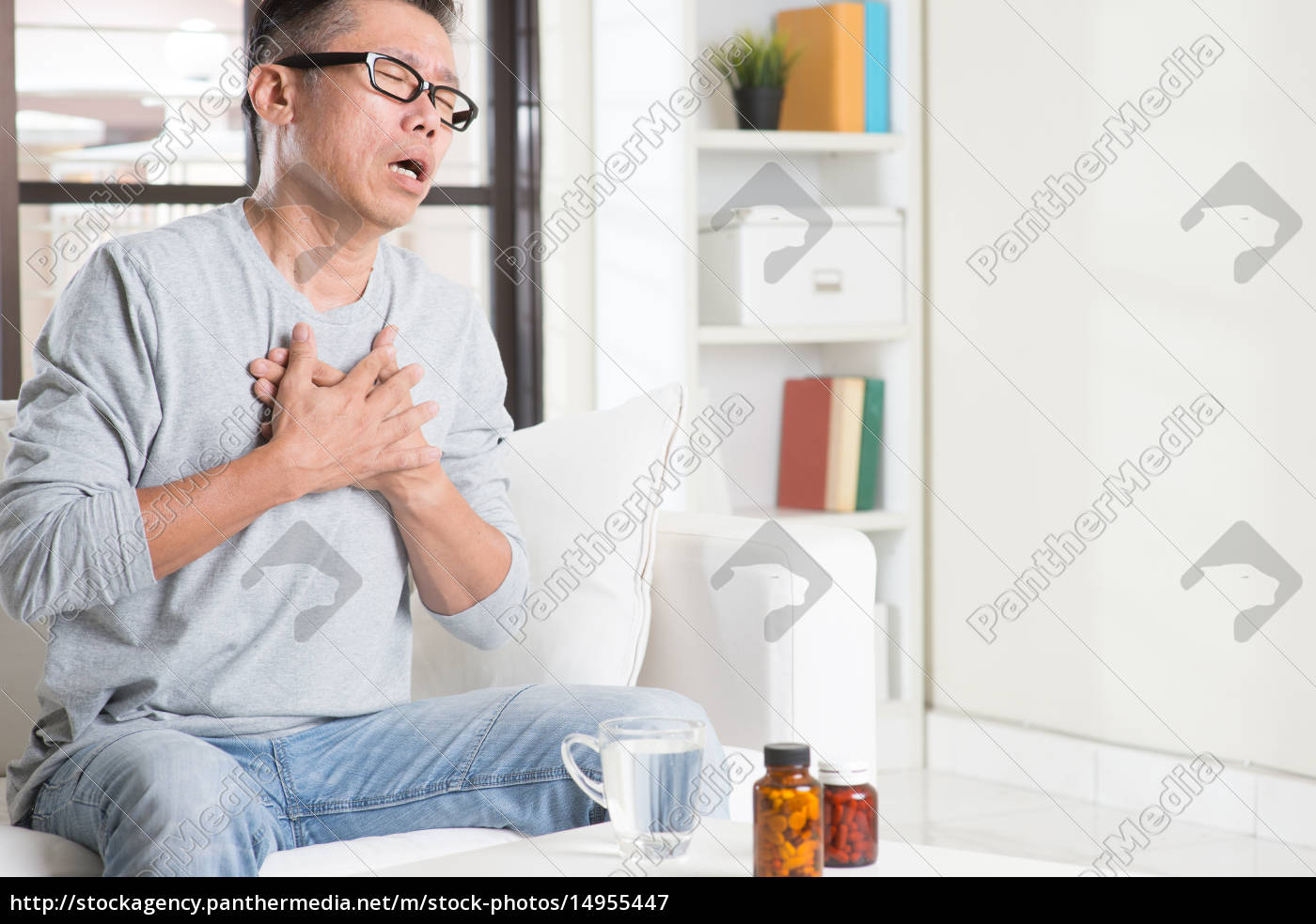 Mature Asian man heart attack - Royalty free image #14955447 | PantherMedia  Stock Agency